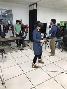 Professor Li experiments with the AR teleoperation interface at Brown University Robotics Lab