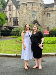 Dr. Liz and Dr. Caroline post in front of the lovely Higgins House